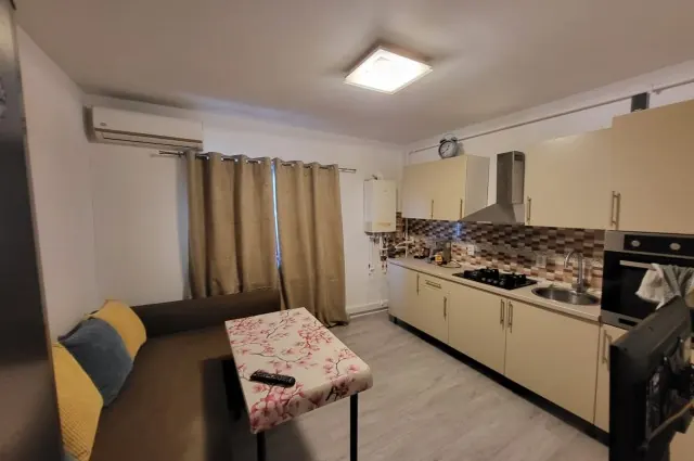 Apartament cu 2 camere de vânzare în Otopeni, zona centrală, fotografia 2